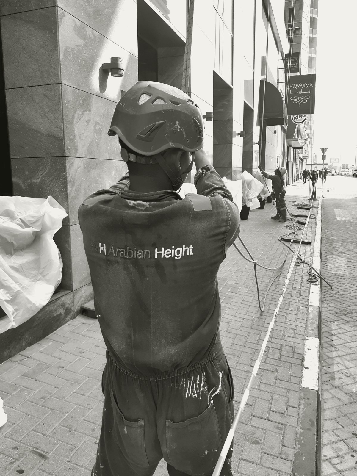 Arabian Height technician in branded uniform on site